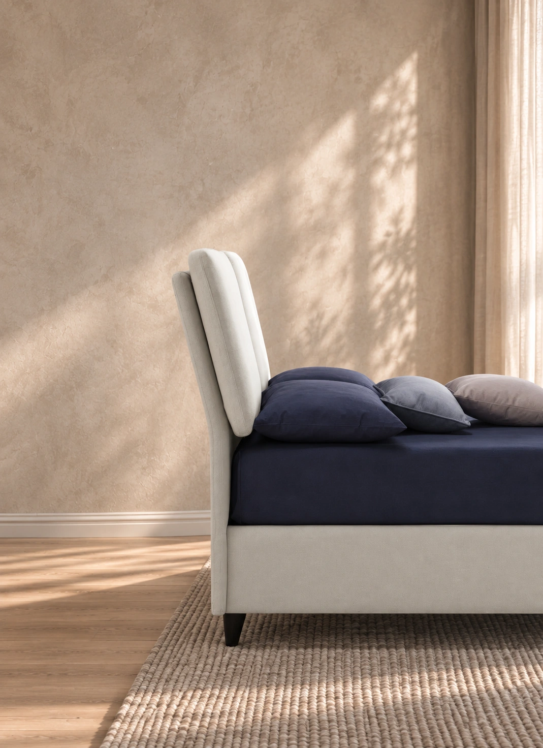 Side detail of the Jole headboard in a coordinated setting